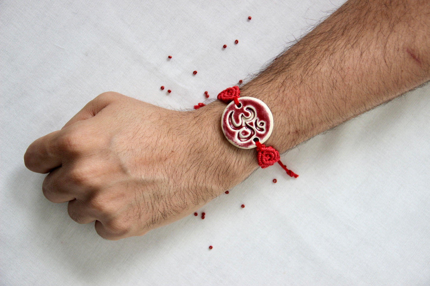 Om Charm Woven Bracelet Single Rakhi | Red