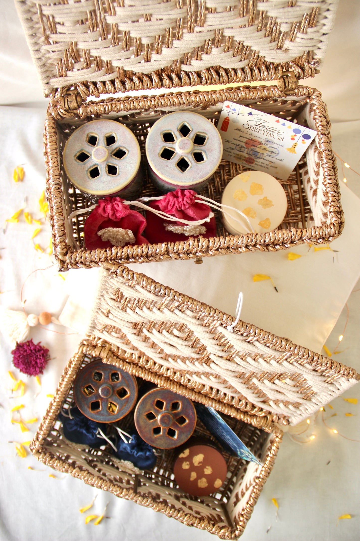 Woven storage baskets with sewing supplies on a light background