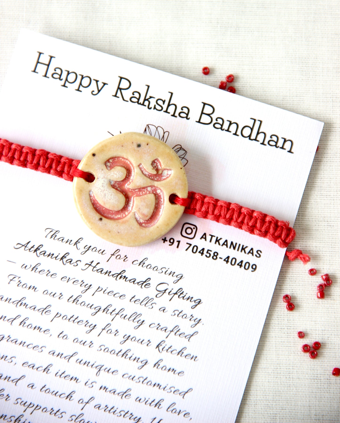 Om Charm Single Rakhi | Sacred Red