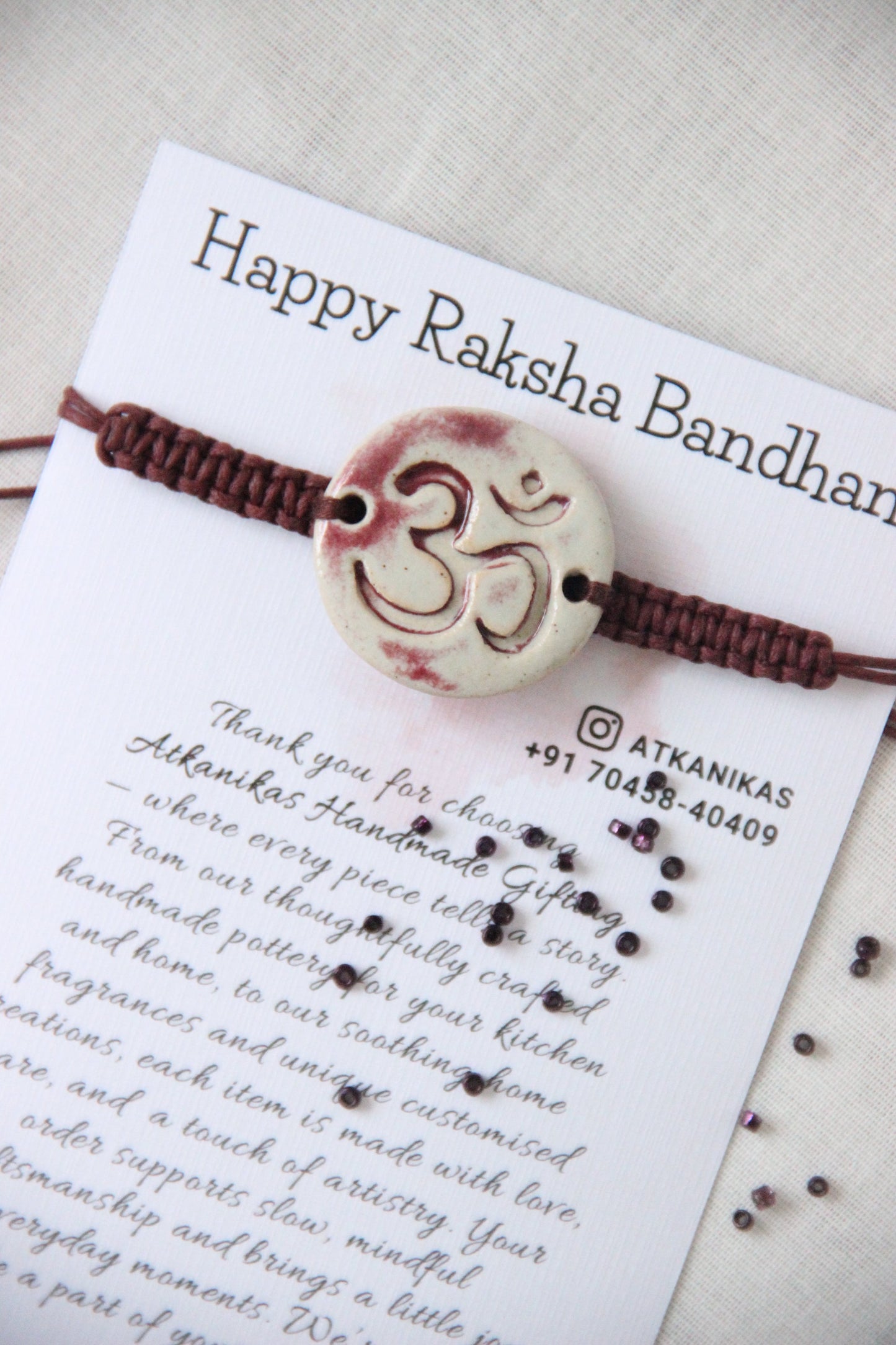 Om Charm Single Rakhi | Brown