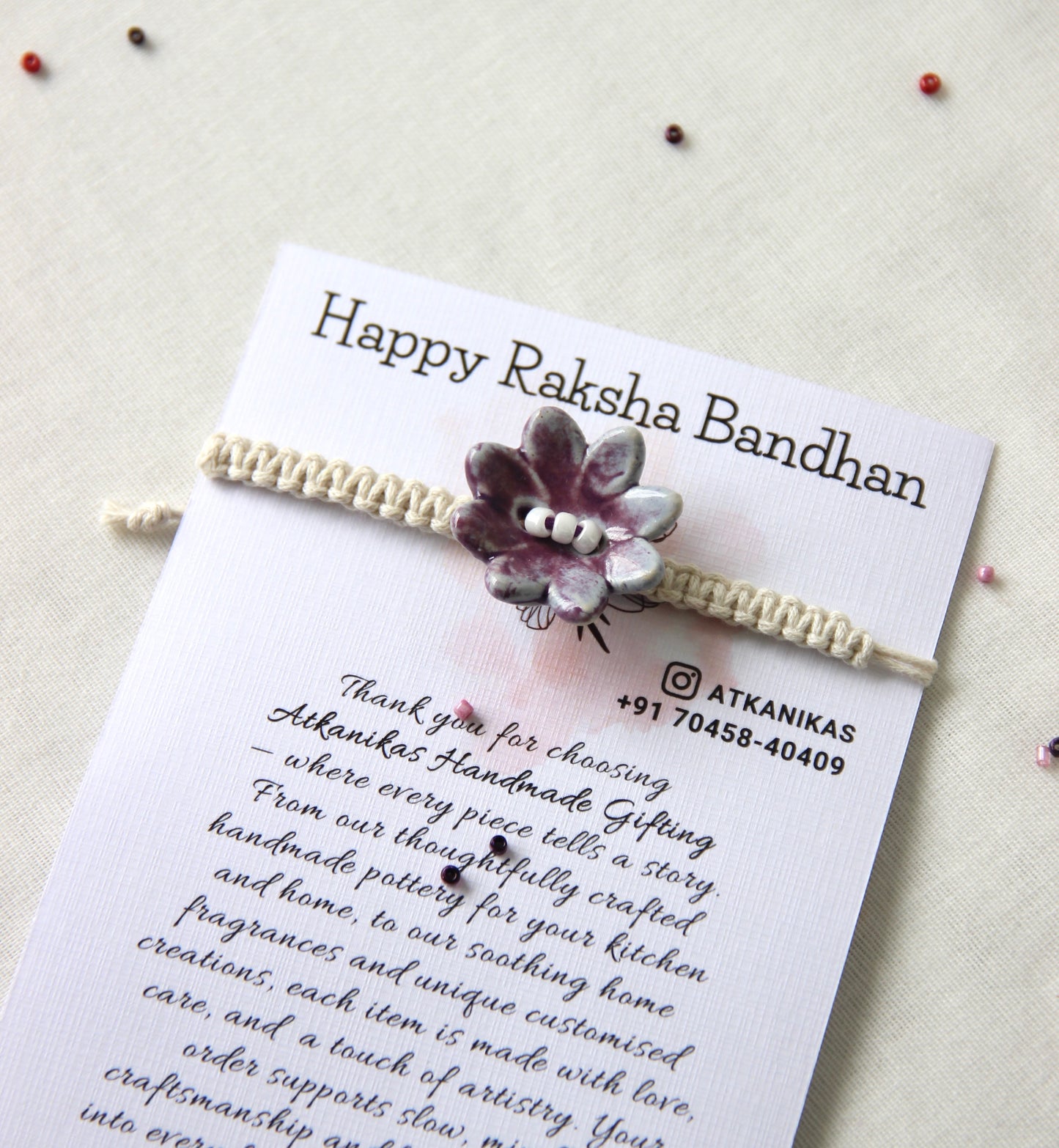 Bloom Charm Single Rakhi | Orchid Pearl