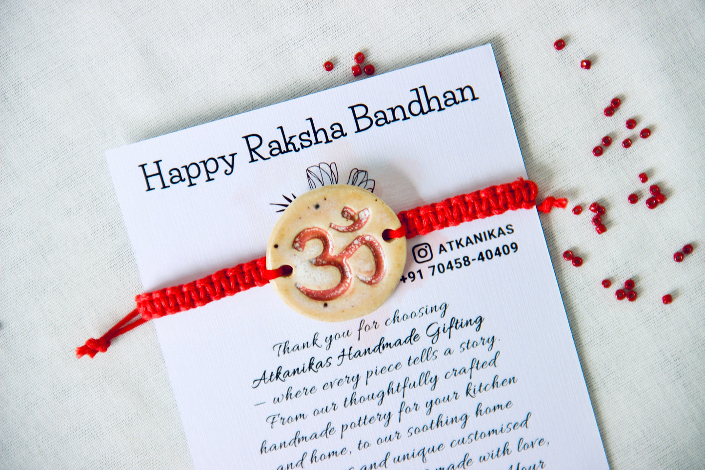 Om Charm Single Rakhi | Sacred Red