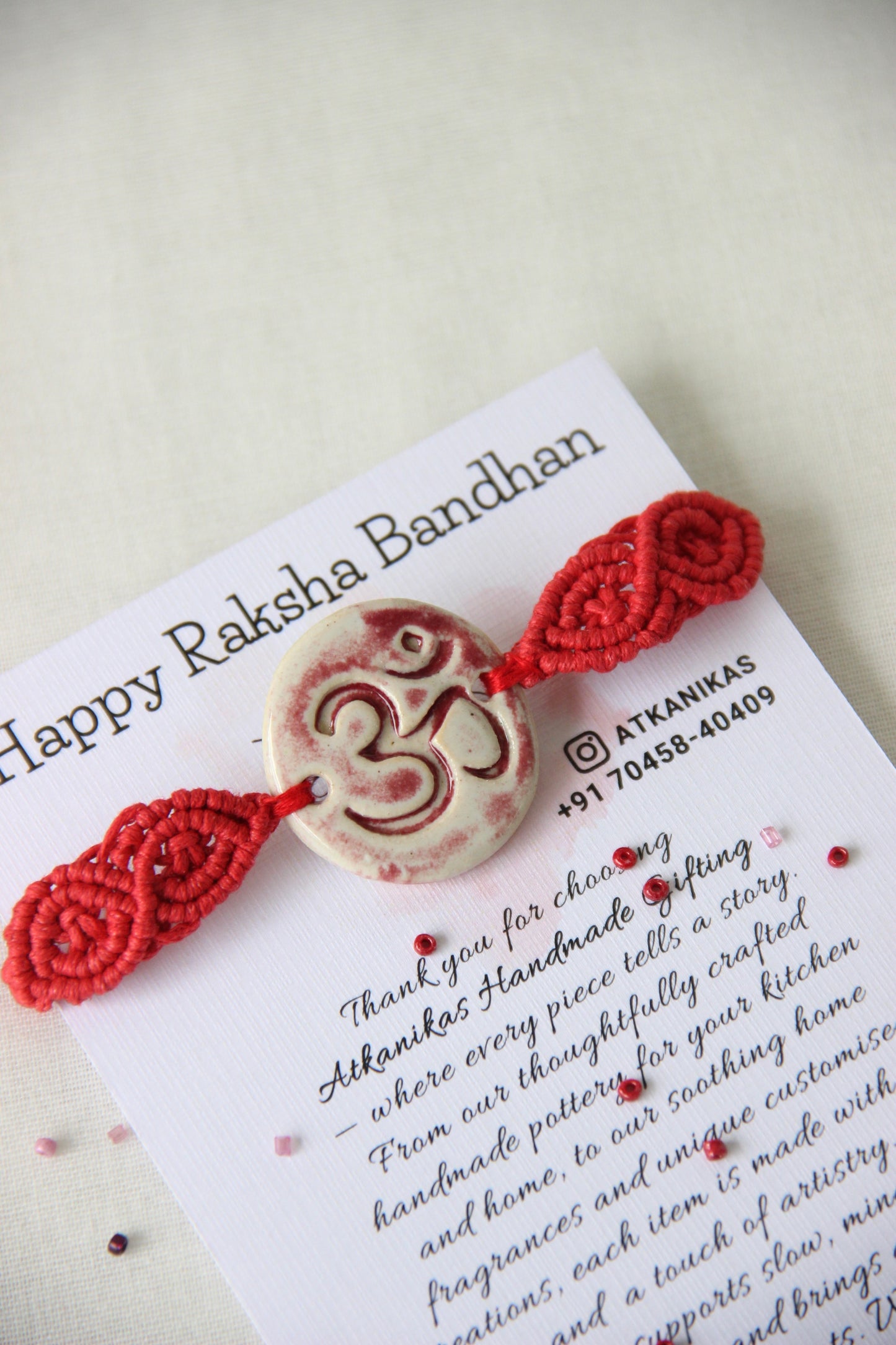 Om Charm Woven Bracelet Single Rakhi | Red