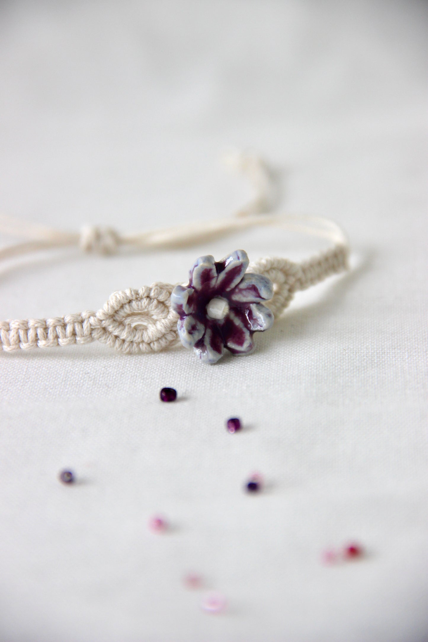 Bloom Charm Woven Bracelet Single Rakhi | Orchid Pearl