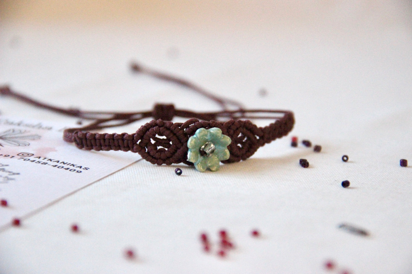 Bloom Charm Woven Bracelet Single Rakhi | Brown